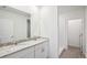 Bathroom boasts double vanity and a shower at 14040 Crutchfield Ct, Parrish, FL 34219