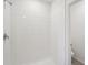 Clean and modern bathroom with a white tiled shower at 14040 Crutchfield Ct, Parrish, FL 34219