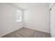 Well-lit bedroom with carpet and window at 14040 Crutchfield Ct, Parrish, FL 34219