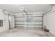 Clean and spacious garage with an automatic door opener at 14040 Crutchfield Ct, Parrish, FL 34219