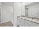 Modern bathroom with double vanity and shower at 14052 Crutchfield Ct, Parrish, FL 34219