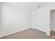 Bedroom with carpet and double sliding closet doors at 14052 Crutchfield Ct, Parrish, FL 34219