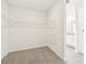 Spacious walk-in closet with wire shelving provides ample storage at 14053 Crutchfield Ct, Parrish, FL 34219