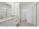 Bathroom with double vanity, granite countertop and shower at 7806 Gilchrist Springs Dr, Parrish, FL 34219