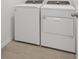 Laundry room with Whirlpool washer and dryer at 7806 Gilchrist Springs Dr, Parrish, FL 34219