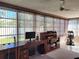 Sunlit office features built-in desk and window views at 2587 Blackwood Cir, Clearwater, FL 33763