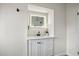 Vanity with a modern vessel sink and mirror at 5818 18Th S Ave, Gulfport, FL 33707