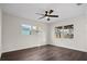 Bright bedroom with new flooring and ceiling fan at 5818 18Th S Ave, Gulfport, FL 33707