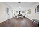 Simple dining area with wooden table and chairs at 5818 18Th S Ave, Gulfport, FL 33707