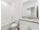 Clean bathroom with a single vanity, shower, and bathtub at 3582 Moscato Dr, Brooksville, FL 34602