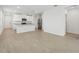 Open concept kitchen and living area with light wood flooring at 3622 Moscato Dr, Brooksville, FL 34602