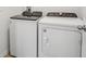 Laundry room with Whirlpool washer and dryer at 3622 Moscato Dr, Brooksville, FL 34602