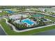 Community clubhouse, pool, and sports courts at 16093 Ivy Ridge Ct, Port Charlotte, FL 33953