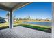 Large covered patio overlooking a lake at 16093 Ivy Ridge Ct, Port Charlotte, FL 33953