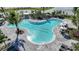 Freeform pool with plenty of lounge space at 16093 Ivy Ridge Ct, Port Charlotte, FL 33953