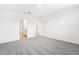 Spacious bedroom with plush carpeting and access to a bathroom at 31650 Malbec Dr, Brooksville, FL 34602