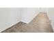 Clean hallway with grey tile floor at 31650 Malbec Dr, Brooksville, FL 34602