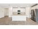 Modern kitchen with granite countertops and stainless steel appliances at 31650 Malbec Dr, Brooksville, FL 34602