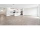 Open concept kitchen with island and stainless steel appliances at 31650 Malbec Dr, Brooksville, FL 34602