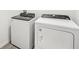 Laundry room with Whirlpool washer and dryer at 31650 Malbec Dr, Brooksville, FL 34602