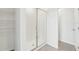 Clean bathroom with walk-in shower and ample storage at 31698 Wild Grape Ln, Brooksville, FL 34602