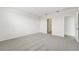 Bright bedroom featuring carpeted floors and access to bathroom at 31698 Wild Grape Ln, Brooksville, FL 34602