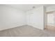 Spacious bedroom with double door closet and neutral decor at 31698 Wild Grape Ln, Brooksville, FL 34602