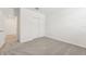 Bedroom with double door closet and carpet at 31698 Wild Grape Ln, Brooksville, FL 34602