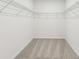 Large walk-in closet with wire shelving at 31698 Wild Grape Ln, Brooksville, FL 34602