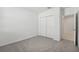 Spacious bedroom with double door closet and carpet at 31703 Wild Grape Ln, Brooksville, FL 34602