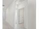 Bright hallway with doors to other rooms at 31703 Wild Grape Ln, Brooksville, FL 34602