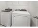 Laundry room with washer and dryer at 31703 Wild Grape Ln, Brooksville, FL 34602