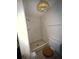 Bathroom with shower stall, toilet, and ceiling fan at 3741 Baden Dr, Holiday, FL 34691