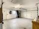 Attached garage with ample space for storage and vehicles at 7384 Van Lake Dr, Englewood, FL 34224