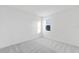 Bright bedroom with carpet flooring and a window at 1044 Signet Dr, Apollo Beach, FL 33572