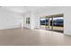 Bright dining room with sliding glass doors leading to patio at 1044 Signet Dr, Apollo Beach, FL 33572