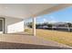 Covered patio overlooks a canal with water access and neighboring homes at 1044 Signet Dr, Apollo Beach, FL 33572