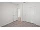 Bright bedroom with carpet and double door closet at 120 Whiteland Bnd, Nokomis, FL 34275
