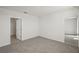 Spacious bedroom with carpeting and access to a bathroom at 120 Whiteland Bnd, Nokomis, FL 34275