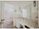 Clean bathroom with a shower, sink, and toilet at 7256 Pinehurst Dr, Spring Hill, FL 34606