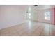 Living room with tile floors and access to other rooms at 7256 Pinehurst Dr, Spring Hill, FL 34606