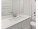 Bathroom features a vanity with a quartz countertop at 13851 Richland Gulf Cir, Parrish, FL 34219