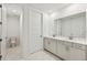 Double vanity bathroom with toilet and marble flooring at 13851 Richland Gulf Cir, Parrish, FL 34219