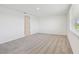 Bright bedroom with carpeted floors and access to a bathroom at 13851 Richland Gulf Cir, Parrish, FL 34219