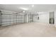 Two-car garage with ample space for storage at 13851 Richland Gulf Cir, Parrish, FL 34219