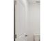 Simple bathroom with toilet and door at 14036 Crutchfield Ct, Parrish, FL 34219