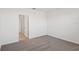 Simple bedroom with carpet and access to a bathroom at 14036 Crutchfield Ct, Parrish, FL 34219
