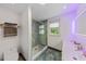 Modern bathroom with double vanity and walk-in shower at 2514 Beach S Blvd, Gulfport, FL 33707