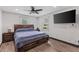 Main bedroom with wood floors and large bed at 2514 Beach S Blvd, Gulfport, FL 33707