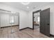 Bright bedroom with mirrored closet and view of living area at 2514 Beach S Blvd, Gulfport, FL 33707